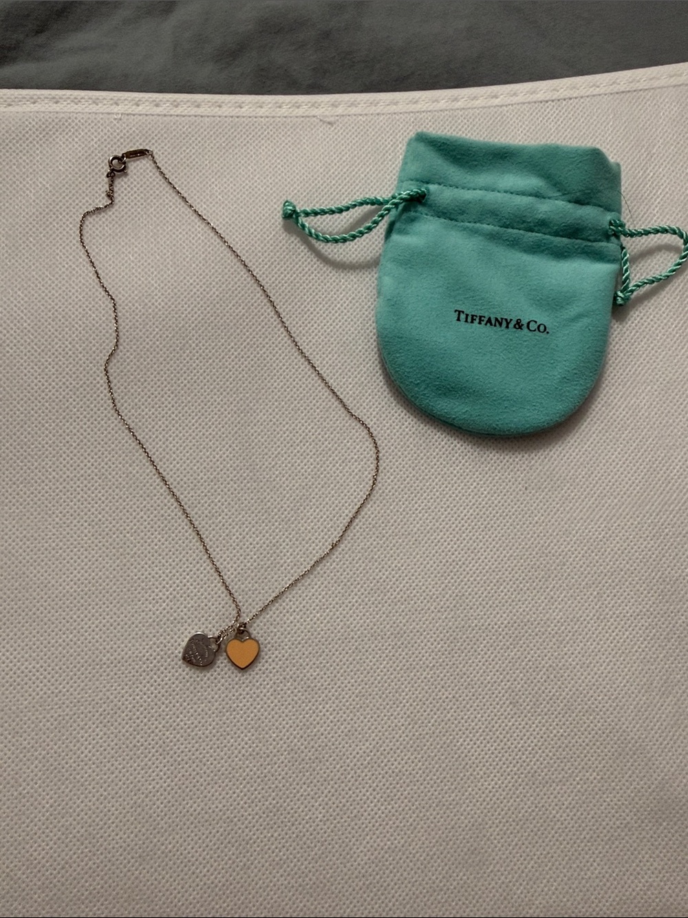 Tiffany & Co. Pink enamel heart necklace.